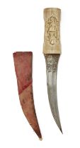 A walrus ivory hilted dagger, Qajar, Iran, 19th century, The double fullered curved blade engra...