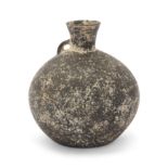 An intact grey pottery globular flask, North Iran, late 2nd – mid 1st Millennium B.C. with funn...