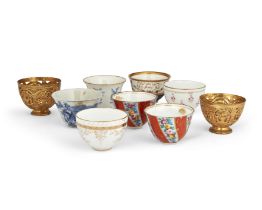 Seven porcelain zarfs and two tombak zarf holders, Ottoman Turkey, Europe and Japan, 18th and 19t...