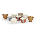 Seven porcelain zarfs and two tombak zarf holders, Ottoman Turkey, Europe and Japan, 18th and 19t...