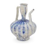 To Be Sold With No Reserve A globular cobalt blue and white pottery jug, Kashan, Central Iran, ...