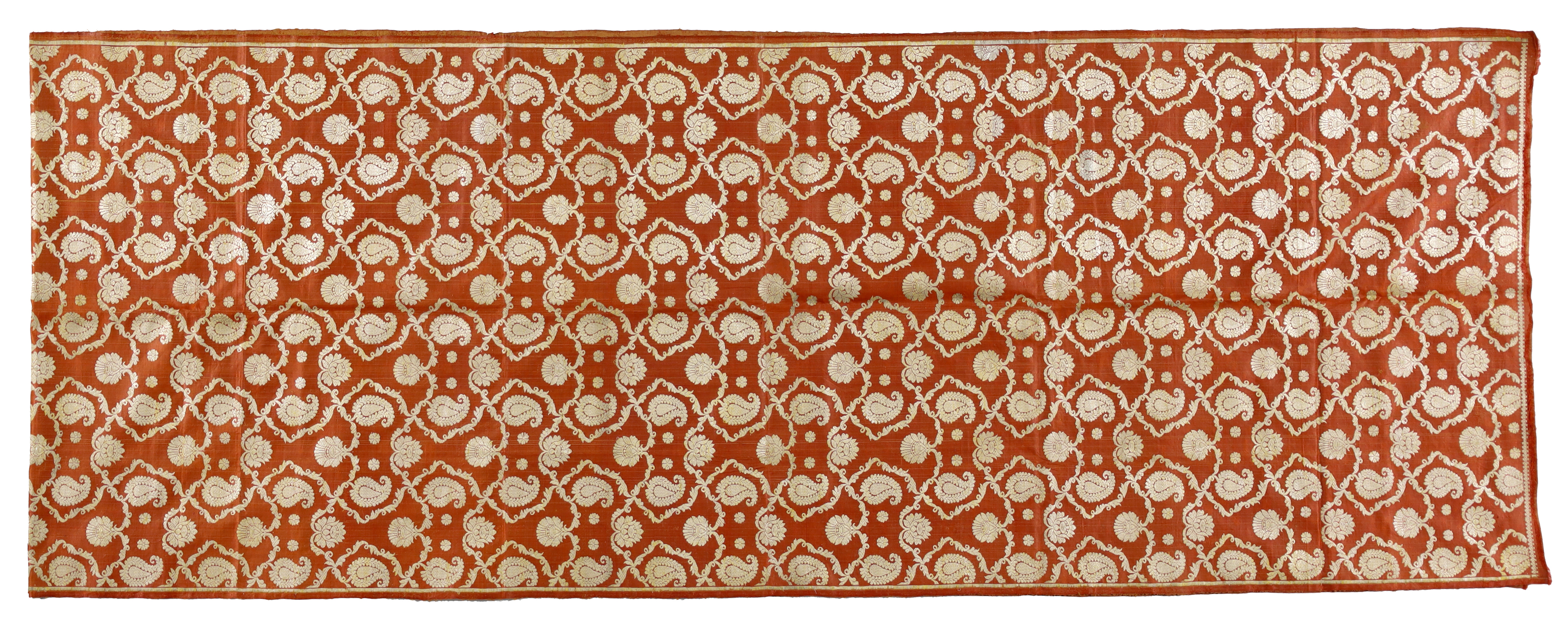 A woven silk panel, possibly India, 20th century, with botehs and flower heads on a delicate la...