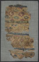 A Fatimid fragmentary textile fragment with rabbits and swans, Egypt, 12th century Alternating ...