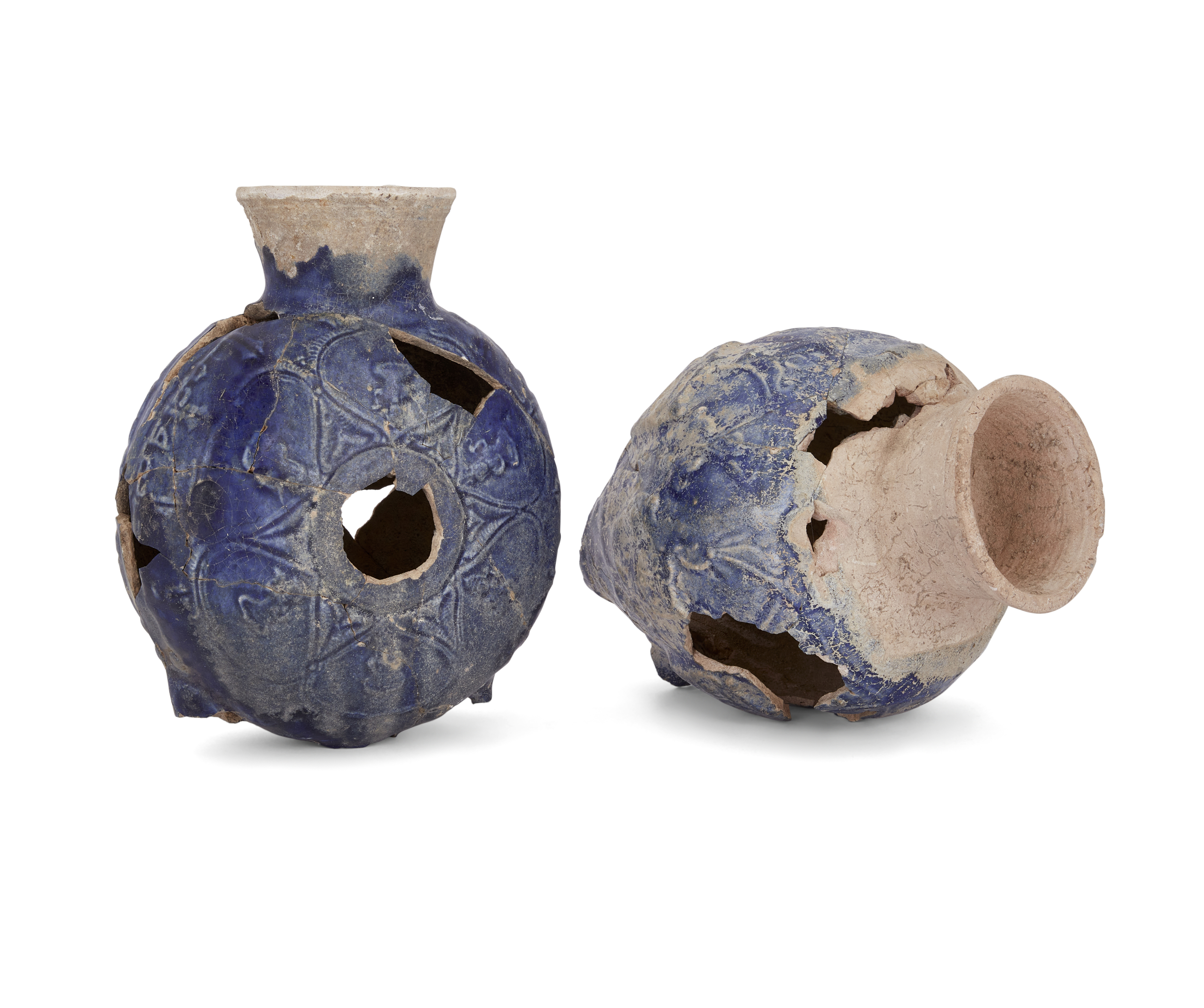 To Be Sold With No Reserve A cobalt-blue glazed fragmentary moulded flask and a cobalt-blue glaz...