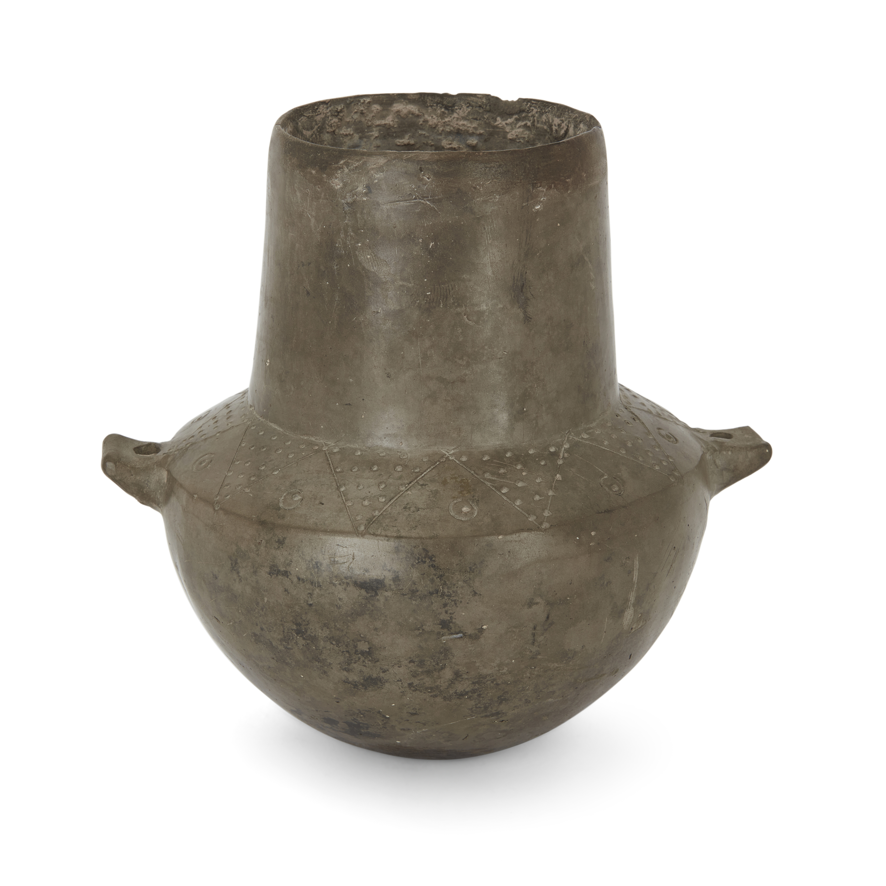 An impasto-ware pottery urn, Villanovan, 8th century B.C. 15.2 cm. high Provenance: With Johna...