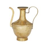 A Tibetan brass ewer, 19th century, on a raised cylinder foot, joined at the shoulder, curved fac...