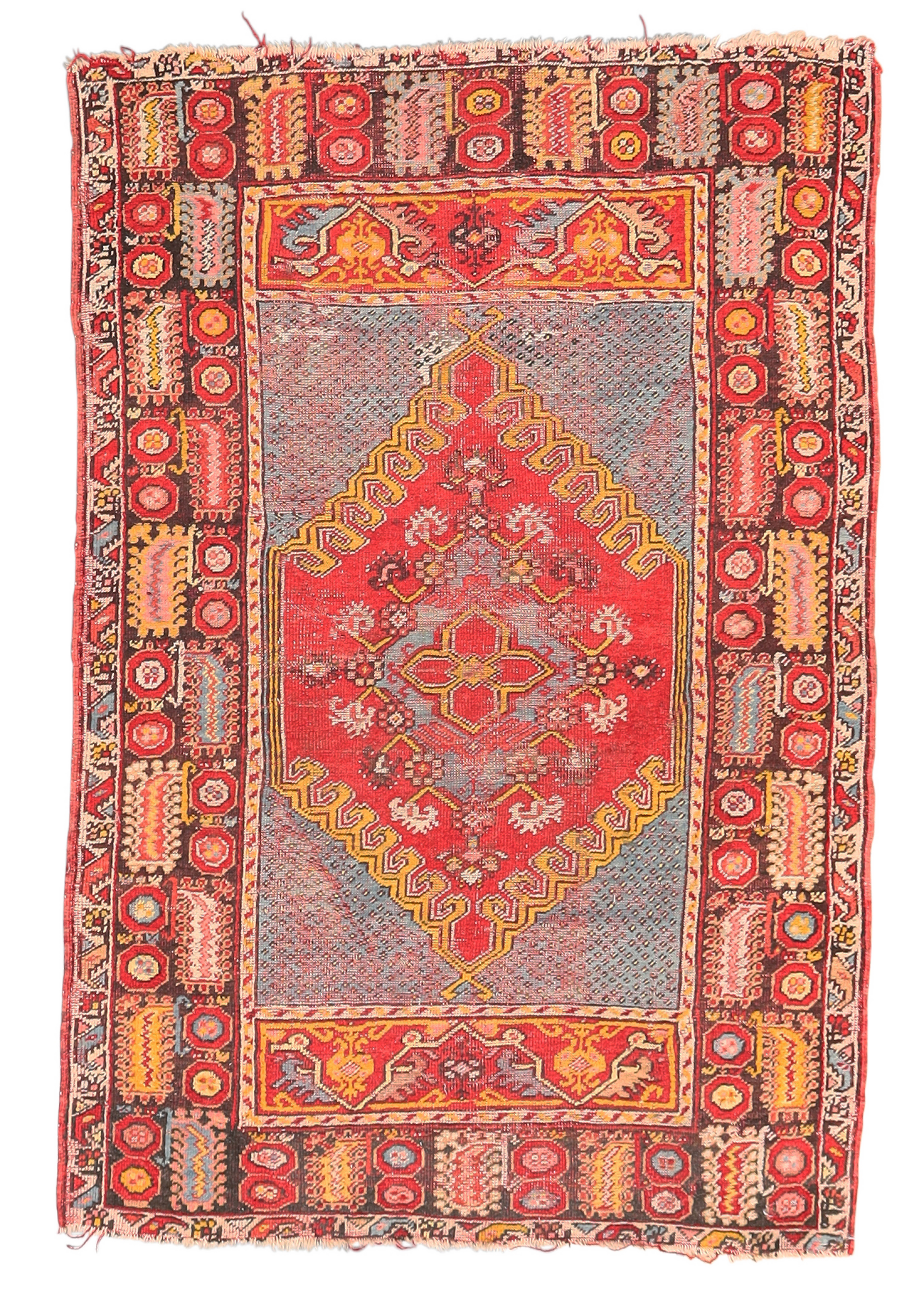 A Turkish Melas rug, first quarter 20th century, the central field with diamond medallion, on a r...