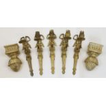 Five gilt metal single-light wall appliques of Louis XVI style, 20th century, each with fluted co...