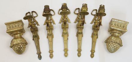 Five gilt metal single-light wall appliques of Louis XVI style, 20th century, each with fluted co...