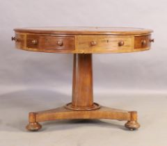 A Victorian mahogany drum table, third quarter 19th century, the circular top inset with leather ...