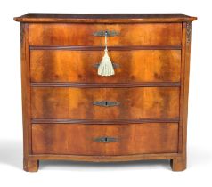 An Empire mahogany serpentine chest, first quarter 19th century, with four graduated drawers, on ...