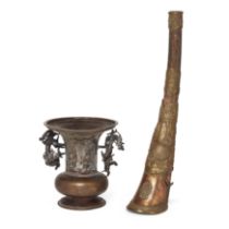 A Chinese bronze vase and Tibetan copper Rkangling horn, 19th century, the bronze vase with compr...