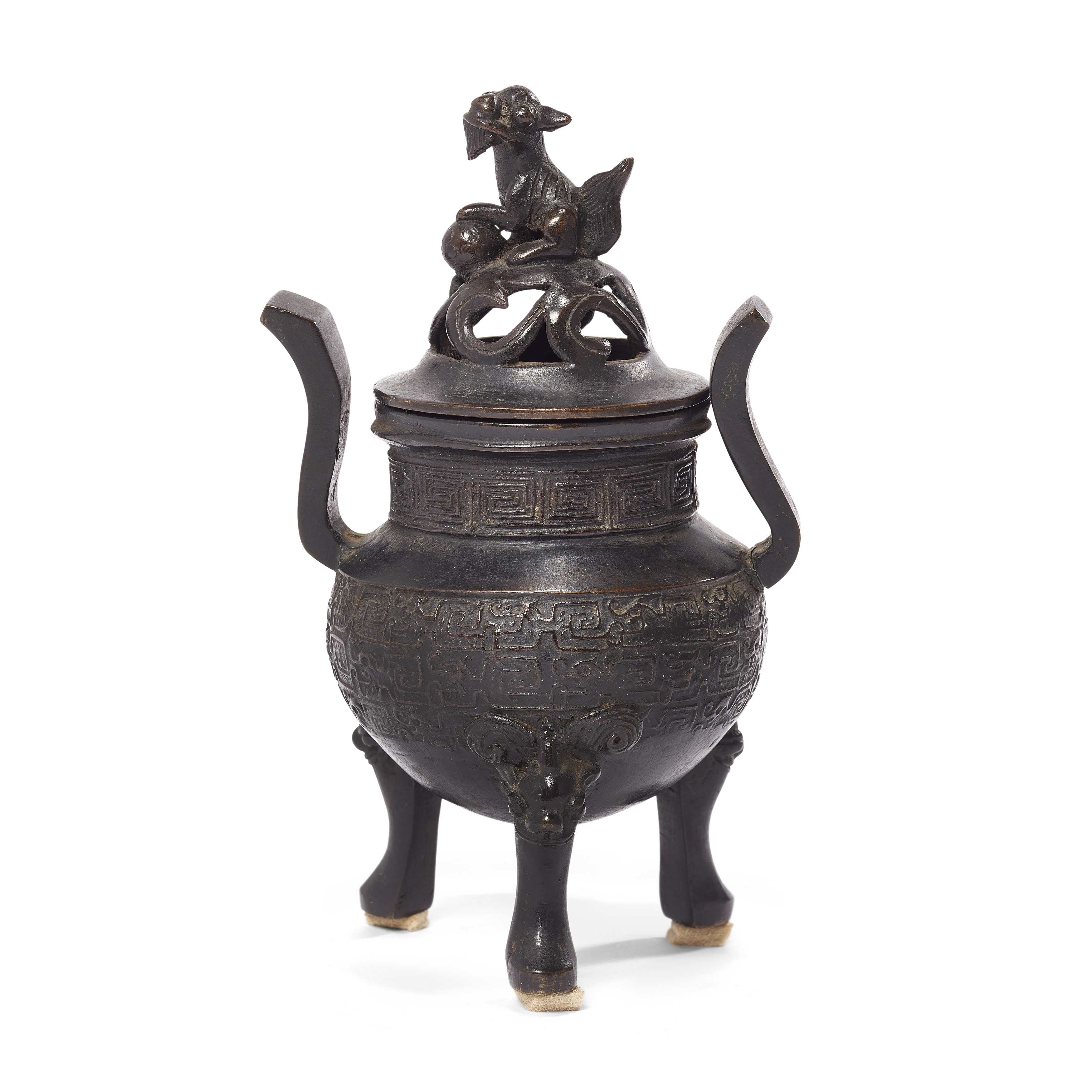 A Chinese bronze tripod incense burner and reticulated cover, ding, Qing dynasty, 17th century, s...