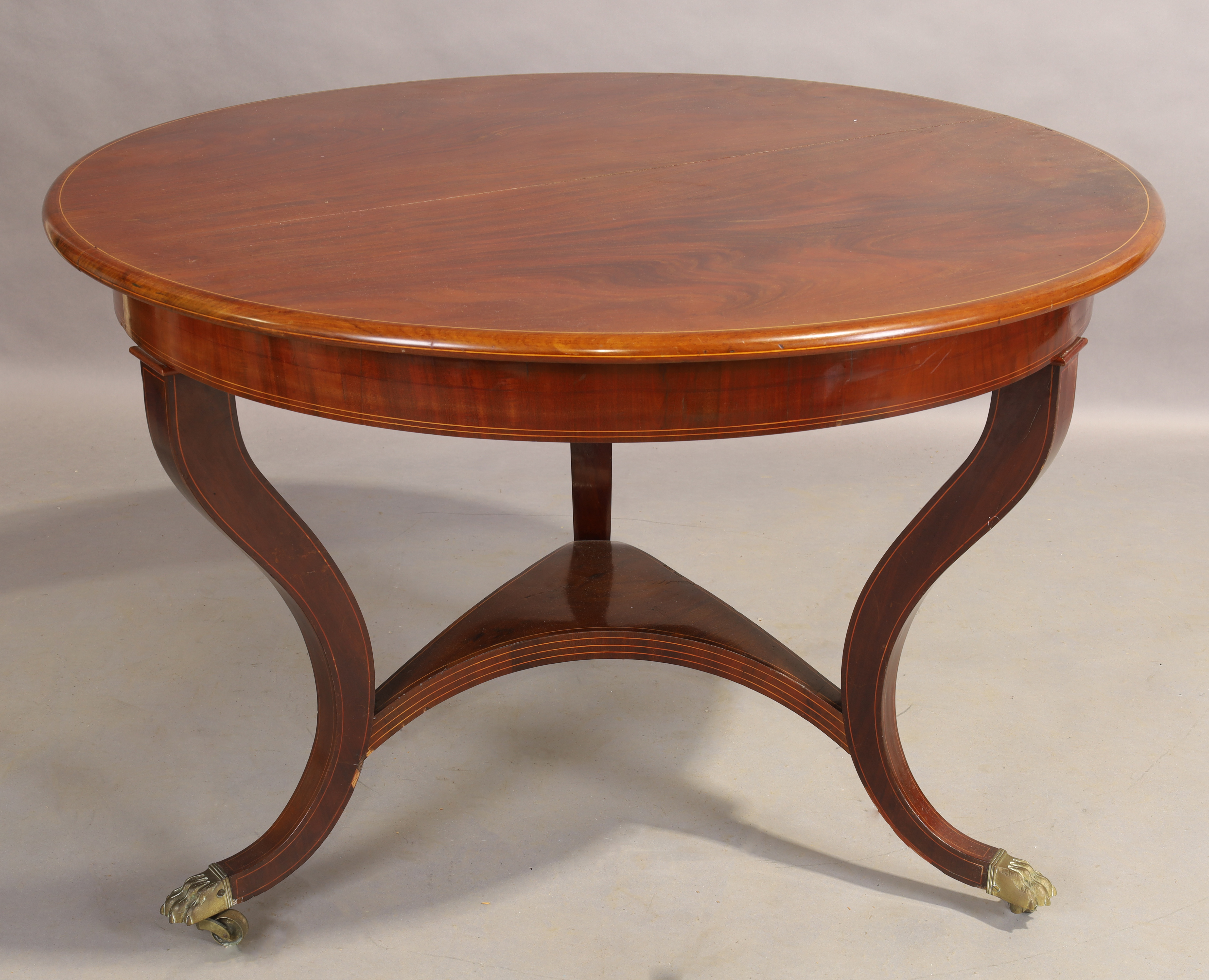 A continental line inlaid mahogany centre table, 19th century, the circular top on three splayed ... - Image 2 of 2