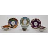 Three French porcelain teacups and saucers, 19th century, to include two in the manner of Jacob P...