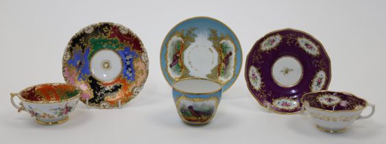 Three French porcelain teacups and saucers, 19th century, to include two in the manner of Jacob P...