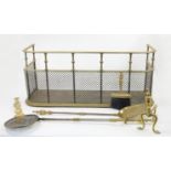 A brass fire guard, late 19th / early 20th century, with shaped rails and mesh lower section, 91c...