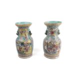 A pair of Chinese famille rose baluster vases, Qing dynasty, 19th century, decorated with four re...