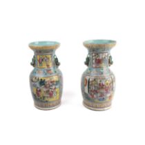 A pair of Chinese famille rose baluster vases, Qing dynasty, 19th century, decorated with four re...