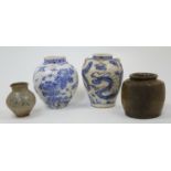 A group of four ceramic vases, Asian and European, to include a Dutch Delft baluster vase, 18th c...