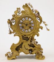 A French ormolu mantel clock by Raingo Freres, of Louis XV style, 19th century, the rococo case w...