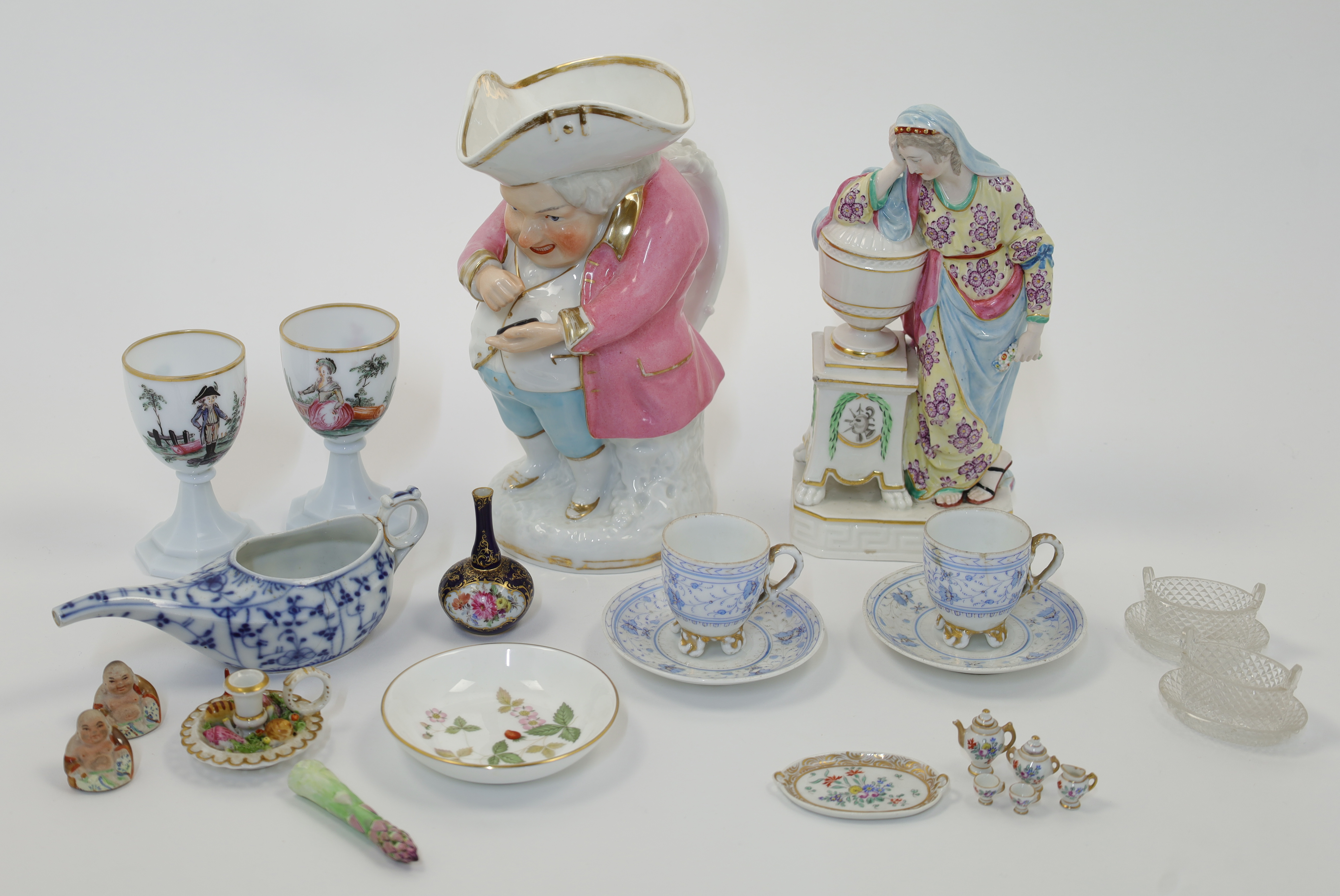 A mixed group of porcelain and glass collectibles, 18th - 20th centuries, comprising: a Derby fig...