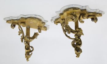 Two pairs of gilt wood wall brackets, late 19th / early 20th century, the first pair with floral ...