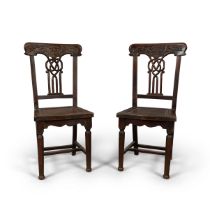 A pair of Anglo-Chinese hardwood chairs Late Qing dynasty/Republic Carved in the European taste...
