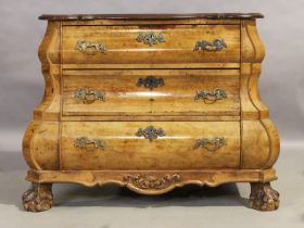 A Dutch walnut bomb commode, first quarter 20th century, the shaped top above three graduated dra...