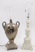 A large white metal urn converted to a table lamp, 20th century, with twin handles and moulded sp...