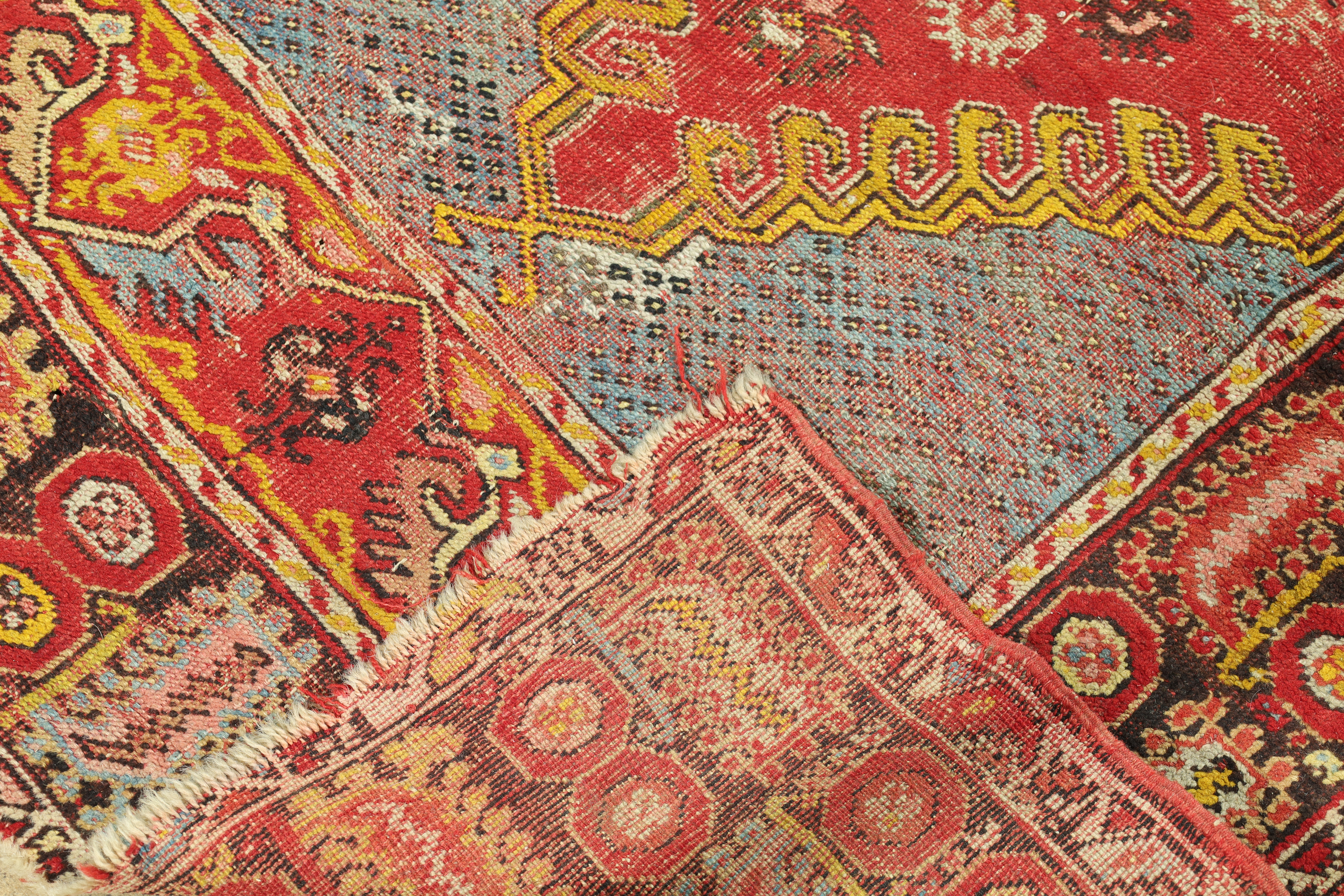 A Turkish Melas rug, first quarter 20th century, the central field with diamond medallion, on a r... - Image 3 of 4