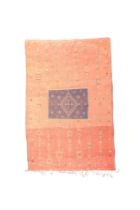 A Moroccan flatweave carpet, geometric motifs, on a red ground, 297 x 193cm Provenance: Property...