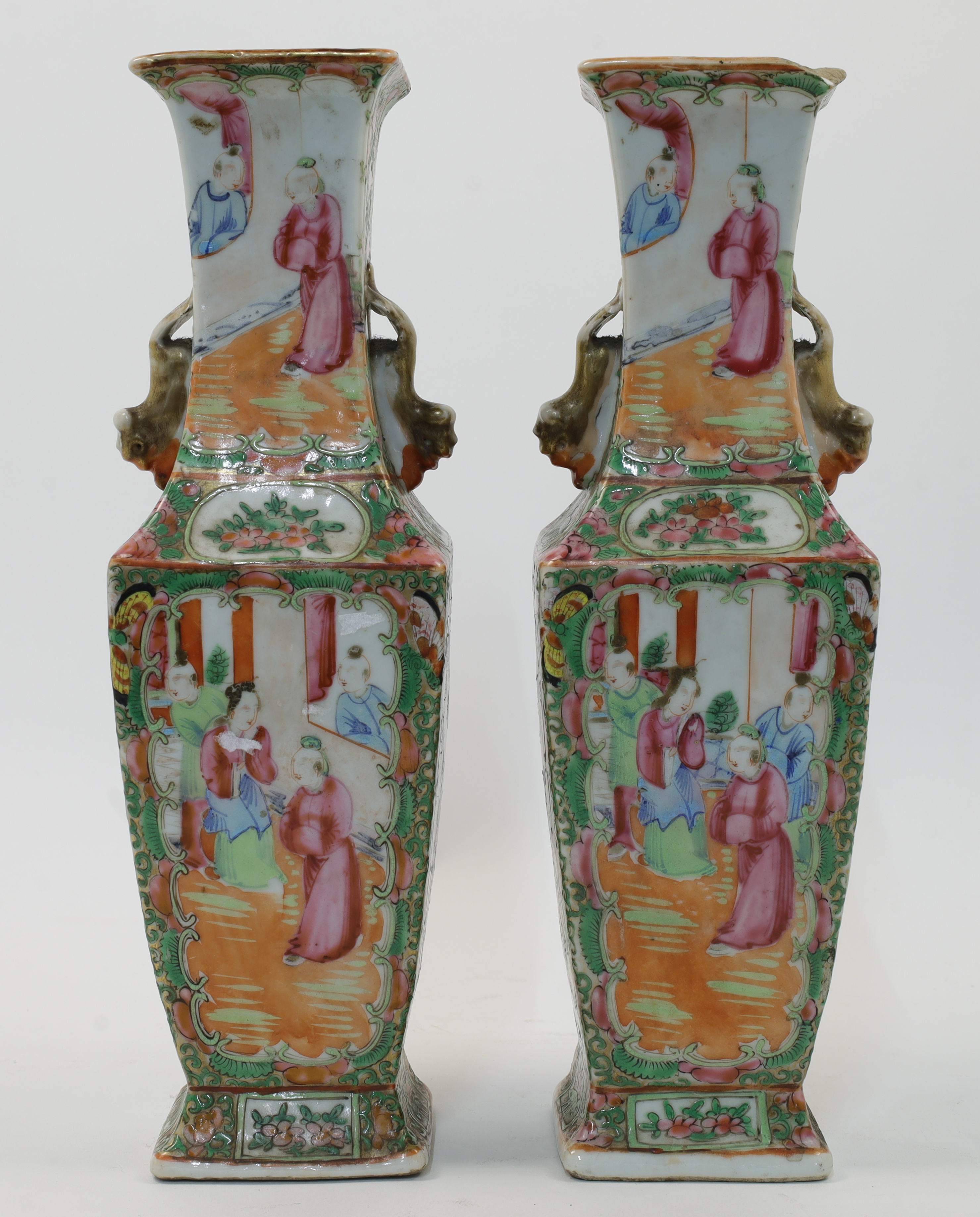 A pair of Chinese Canton famille rose square baluster vases, late 19th century, painted with rese...