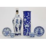 A group of Chinese blue and white porcelain, 19th century, comprising a 'Prunus' sleeve vase, dou...