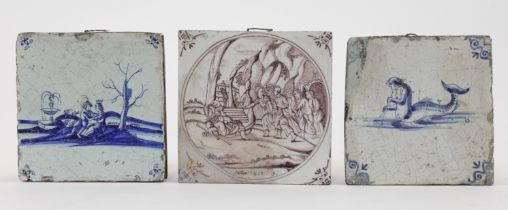 Three Dutch Delft tiles, 18th century, to include one painted in manganese with a biblical scene,...