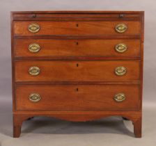 A George III mahogany and line inlaid chest, first quarter 19th century, with brushing slide abov...