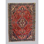 A Persian Nahavand carpet, last quarter 20th century, the central geometric floral medallion surr...