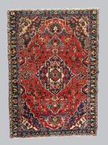 A Persian Nahavand carpet, last quarter 20th century, the central geometric floral medallion surr...