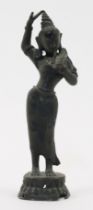 A bronze standing figure of a dancer, India, late 19th century or later, possibly part of a large...