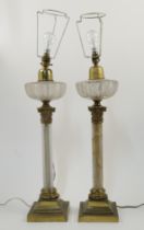 A pair of Victorian oil lamps by Hinks & Son converted for electricity, with cut-glass reservoirs...