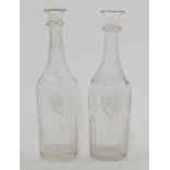 A pair of Napoleon III decanters, second half 19th century, each of slender form with panelled an...
