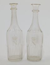 A pair of Napoleon III decanters, second half 19th century, each of slender form with panelled an...