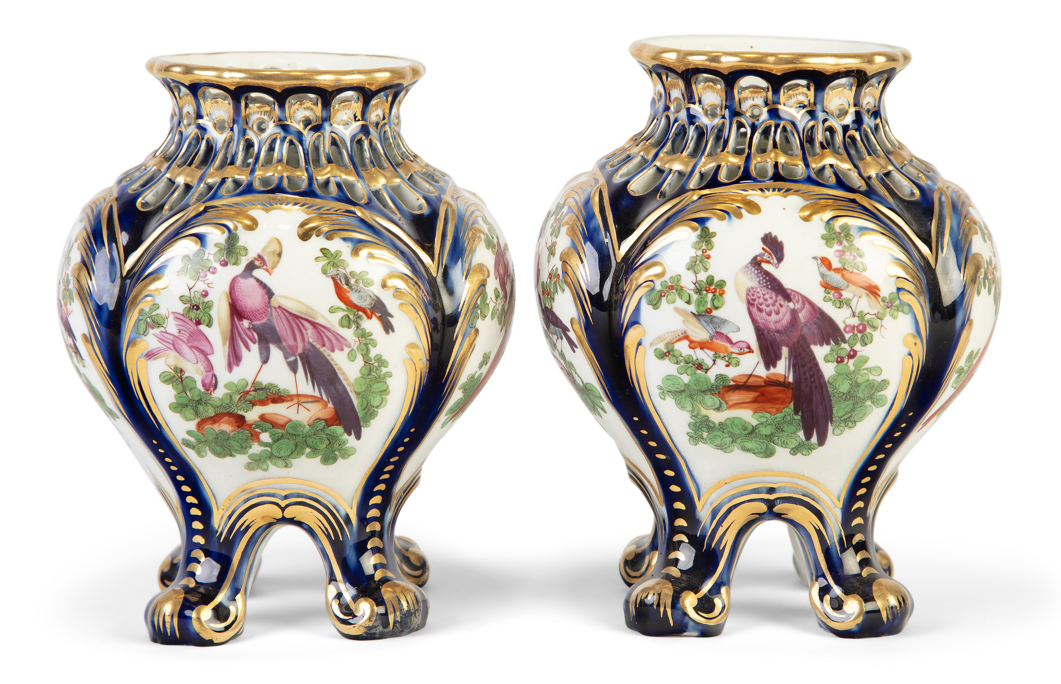A pair of Chelsea porcelain mazarine-blue-ground pot-pourri vases, c.1760-65, gold anchor mark to...