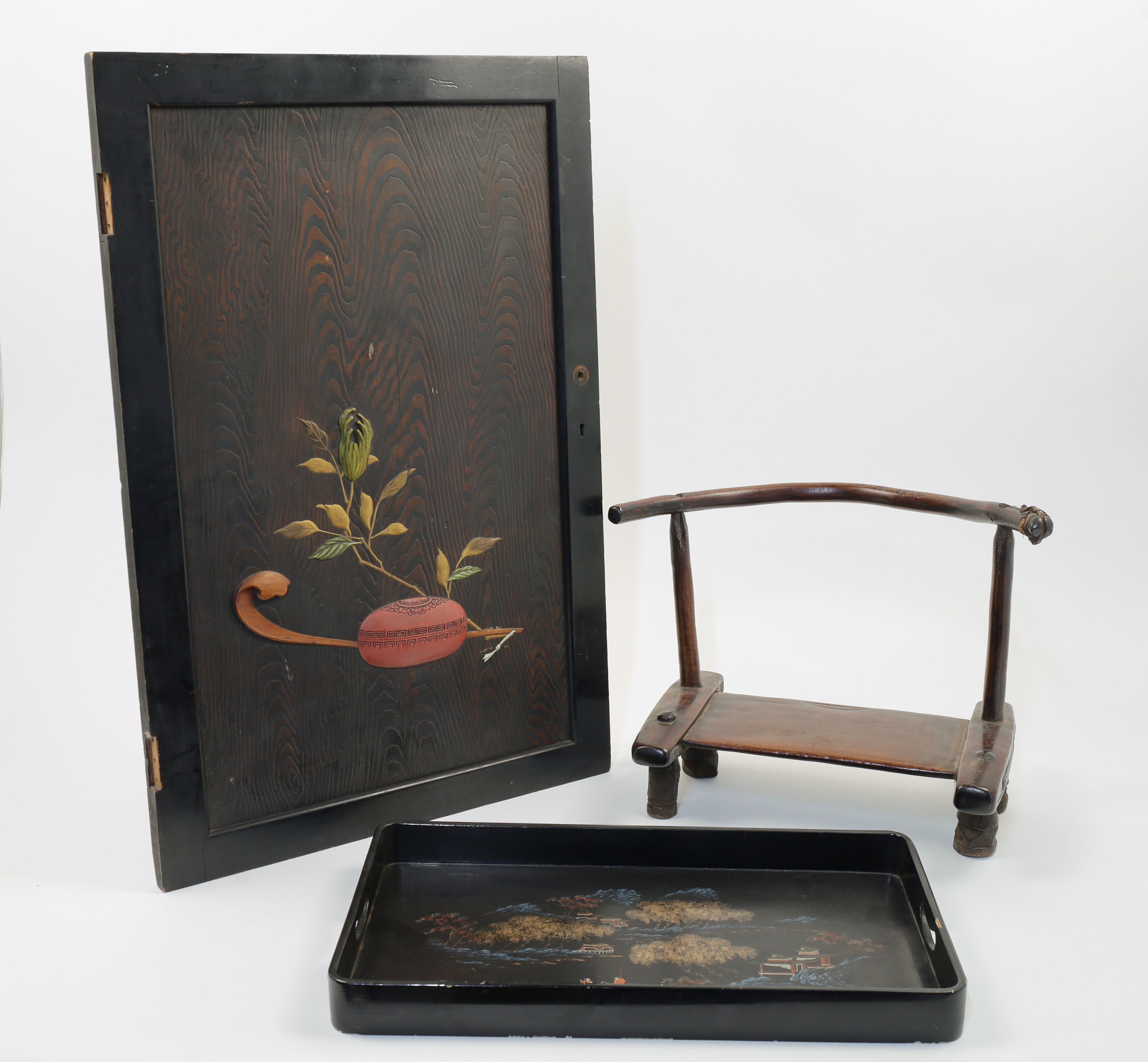 A Japanese cabinet door panel, 20th century, decorated with a depiction of a lacquer box and flow...