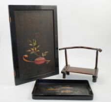 A Japanese cabinet door panel, 20th century, decorated with a depiction of a lacquer box and flow...