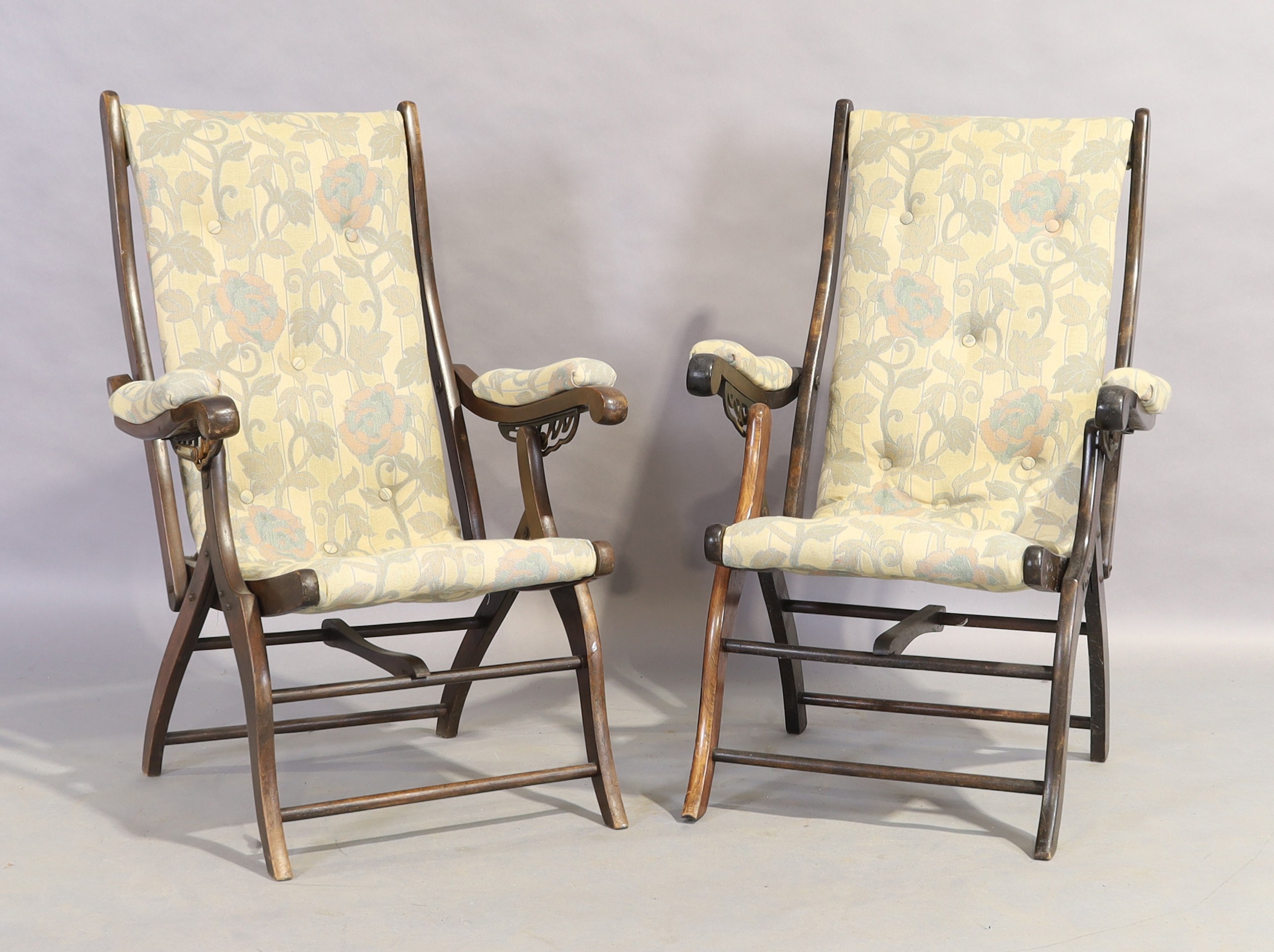A pair of Edwardian stained beech folding steamer chairs, first quarter 20th century (2) Provena...