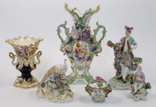A group of Derby and Coalport flower-encrusted porcelain, 18th - 19th centuries, to include a Blo...