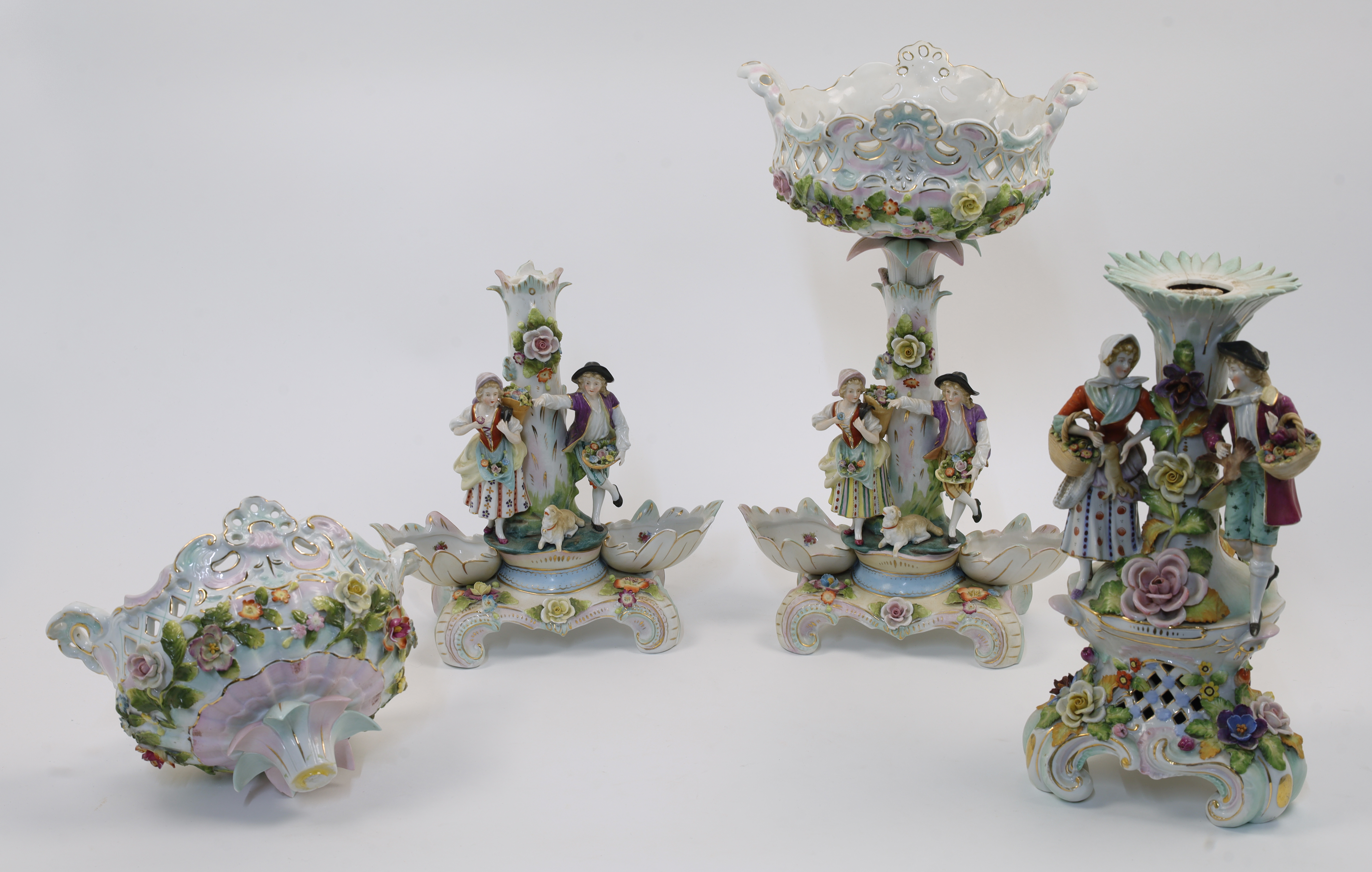 Two Sitzendorf porcelain figural centrepieces, late 19th / early 20th century, blue hatched marks...
