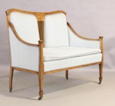 An Edwardian inlaid mahogany salon suite, first quarter 20th century, comprising of settee and fo...
