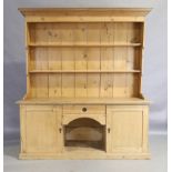 An English pine dresser base, 19th century, with later matching superstructure, 20th century, 203...